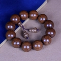 Polished 12-bead Liu Dao Mu wooden prayer bracelet with natural dark brown grain texture - Premium Old Wood 20mm*12 Beads (Gourd Accessory)