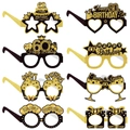 Set di 8 occhiali di carta per il 60 compleanno nero e oro con decorazioni effetto glitter - 60° compleanno