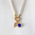 Elegant pearl necklace with 14K gold plated F letter charm and sparkling blue crystal pendant - Letter F