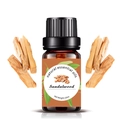 10ml Sandalwood natural essential oil in brown glass bottle with wooden accents - 10ml / Sandalwood