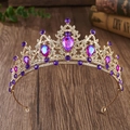 Detailed close-up of Baroque gold crown with large purple teardrop crystals and rhinestones - Gold + Purple AB Rhinestones