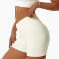 Creamy white V-waist yoga shorts featuring a high-rise fit and seamless ribbed texture - S / Ivory