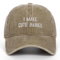 Gros plan sur la casquette en coton lavé vintage avec broderie I MAKE CUTE BABIES - Kaki