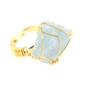 Detailed view of handmade gold wire-wrapped ring with raw light blue agate stone - Adjustable Open / Aquamarine