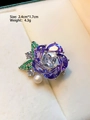 Detailed macro view of purple flower brooch with clear square diamond and white pearl - Purple Flower With Natural Pearl (TB1529)