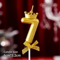 Golden number 7 birthday candle with crown, bow detail and 6cm x 3.2cm size - Crown Bow Golden Number 7 Candle
