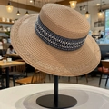Flat top straw sun hat in natural wood color with blue and white geometric ribbon trim - Khaki Bohemian Style Straw Hat (D-490)