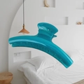 Large 15cm cyan blue shark hair claw clip in a minimalist bedroom setting - Butterfly Back Style / Extra Large (Approx. 15cm) / Cyan Blue