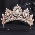Detailed close-up of a golden bridal tiara with sparkling iridescent rhinestones on black - KC Gold White + AB Rhinestones