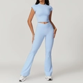 Light blue two-piece yoga set with short sleeve crop top and flared leggings - S / Top And Bottom / Short Sleeve + Flare Pants / Sky Blue