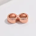 Macro shot of rose gold S925 silver double-loop connector for DIY jewelry making - 8mm Double Ring Connector / Rose Gold