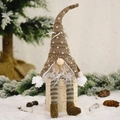 Christmas gnome doll with long legs sitting on a birch-textured base for holiday decor - Khaki