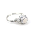 Macro view of handmade wire-wrapped ring with a natural white marble turquoise bead - Synthetic White Turquoise