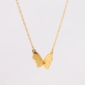 Detailansicht der goldenen Schmetterlingskette mit feiner Textur und O-Gliederkette - Gold