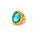 Close-up of golden woven texture band with a large oval blue sapphire stone on male ring - Gold Rhombus Lake Blue Gemstone / Size 11