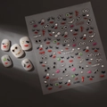 Detailed view of fashion nail art stickers with red lips, heels and golden star patterns - Silver Fashion Elements Style (CO-335 Silver Stamping)