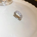 Macro side view of silver layered open ring with sparkling pavé zircons and pearls - Silver Oval Pavé Zirconia Style