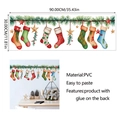 Detail view of 90x30cm PVC Christmas wall stickers with festive socks and green pine needles - 30*90cm Christmas Socks