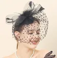 Vintage black pillbox hat with polka dot mesh veil and feather trim for brides - Black