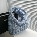 Light blue quilted puffer cloud bag in soft nylon with a stylish shoulder strap design - Light Blue