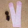 Pink long lace gloves for weddings and driving shown on a plush carpet background - One Size / 43cm Pink