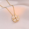 Vintage gold clover necklace featuring heart-shaped cat-eye stones on a delicate O-chain - Gold