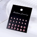 12 pairs of sparkling pink zircon stud earrings set on a black fashion jewelry display card - 12 Pairs Pink Round Set (E0052-1)