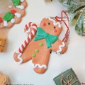Gingerbread man Christmas tree ornament with candy cane and red hanging string - Candy Cane Gingerbread Man 10*8cm