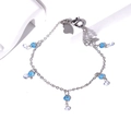 Detailed close-up of S925 sterling silver stamp on butterfly bracelet with blue zircons - Blue and White Crystal Silver