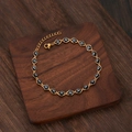 Bracciale a sfere Malocchio dorato con ciondoli blu e chiusura a moschettone regolabile - Nero