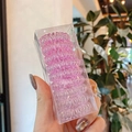 Rosa Telefonkabel-Haargummis in transparenter Box, präsentiert in der Hand - 23# Mittelgroß Verlauf Rosa-Lila