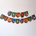 Detail view of Happy Halloween swallowtail banner with pumpkin and ghost graphics - Classic Halloween Banner