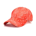 Close-up of classic white paisley pattern on a red canvas baseball cap with curved brim - M (56-58cm) / Red