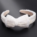 Elegant white pearl and crystal bow headband with soft beige velvet inner lining - Bowknot on Black Base (Series 8-9)