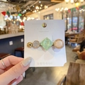 Korean style gold hair clip with pearls, stars, and green crystals on a white card - Irregular Collage Style Hairpin / Light Cyan