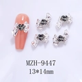 Detail view of 13x14mm silver alloy bow nail charms with grey heart-shaped crystal centers - Silver Bowknot Grey Heart(9447)