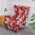 Elastic wingback chair cover featuring a vibrant red fabric with white floral patterns - Garden Style Red