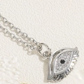 Silver Evil Eye necklace with white zircon stones and black pupil in a stylish finish - Evil Eye / Silver