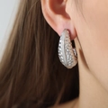 Silver teardrop hoop earrings with hammered texture finish for a modern jewelry look - Silver