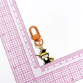 Cartoon Halloween witch keychain with orange D-ring and metal chain shown with scale - Witch (Orange Clasp)