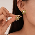 Retro gold earrings with green rhinestones and pearl center shown on a model - Style 1-Green Circle Rhinestone Pearl Studs (Silver Earring Post)