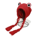 Close-up of red knit frog hat with large decorative eyes and braided tassel straps - M (56-58cm) / Red