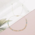 Handmade adjustable beaded bracelet with light blue natural stones and gold metal beads - Light Blue