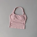 Detail of light pink square neck yoga tank top with seamless ribbed texture and chest pads - Light Pink
