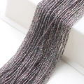 Detailed view of 2mm dark purple iridescent faceted glass beads for DIY jewelry crafts - Pink String Rose Green
