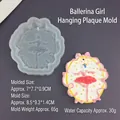 Détail du moule en silicone ballerine avec des échantillons en plâtre finis - Moule d'étiquette de danseuse de ballet