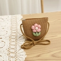 Detail of woven straw purse for kids featuring pink floral decor on light wood background - 52cm 3-6 Years / Bag-Khaki