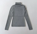 Detail of grey turtleneck knitwear with shawl overlay and four gold decorative buttons - One Size / Gray