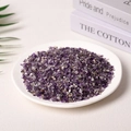 Natural bulk amethyst crystal stones in a white bowl with books and greenery - Amethyst (3-5mm) 100g