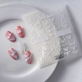 Detailed 5D embossed nail art stickers featuring white lace lingerie and heart patterns - 5D Black Lace Underwear Style (FEB-341)